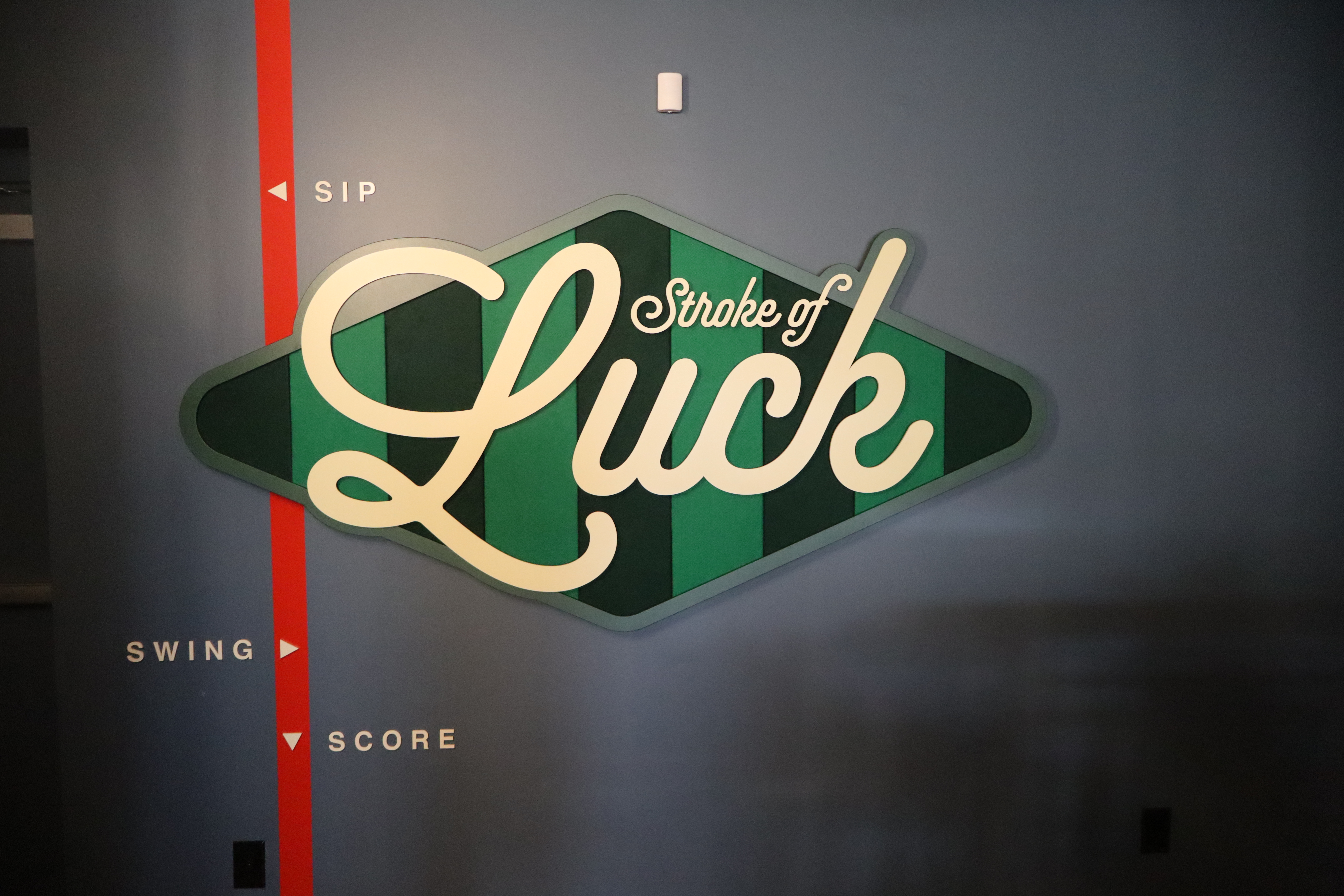 Stroke of Luck wall sign